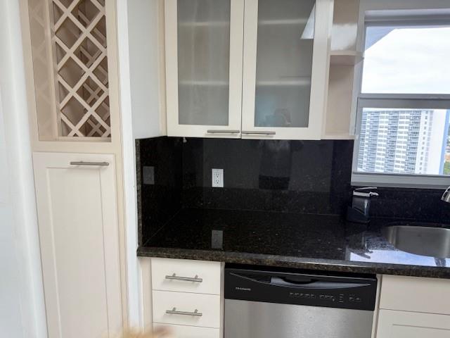 3500 Galt Ocean Drive, Unit 1408 Fort Lauderdale, FL 33308 - Photo 5 of 24 a kitchen with a sink and a mirror
