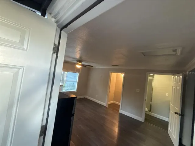 a view of dining room and cabinets
