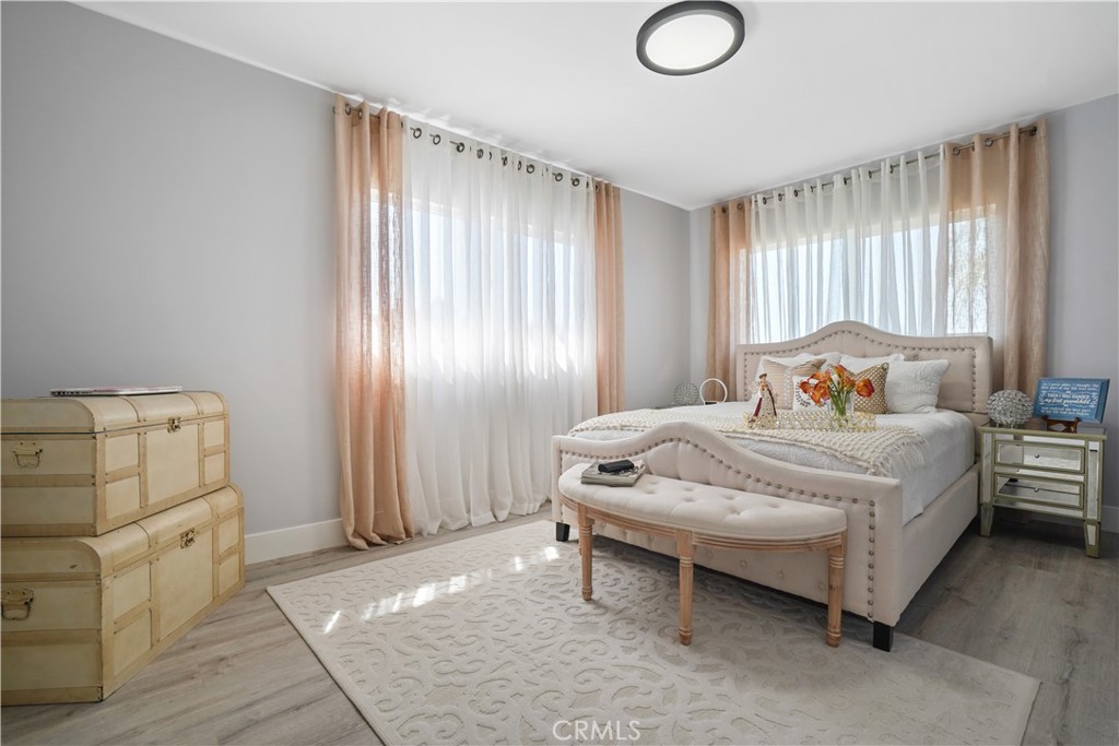 536 Cavanagh Road Glendale, CA 91207 - Photo 11 of 39 a spacious bedroom with a bed and a window
