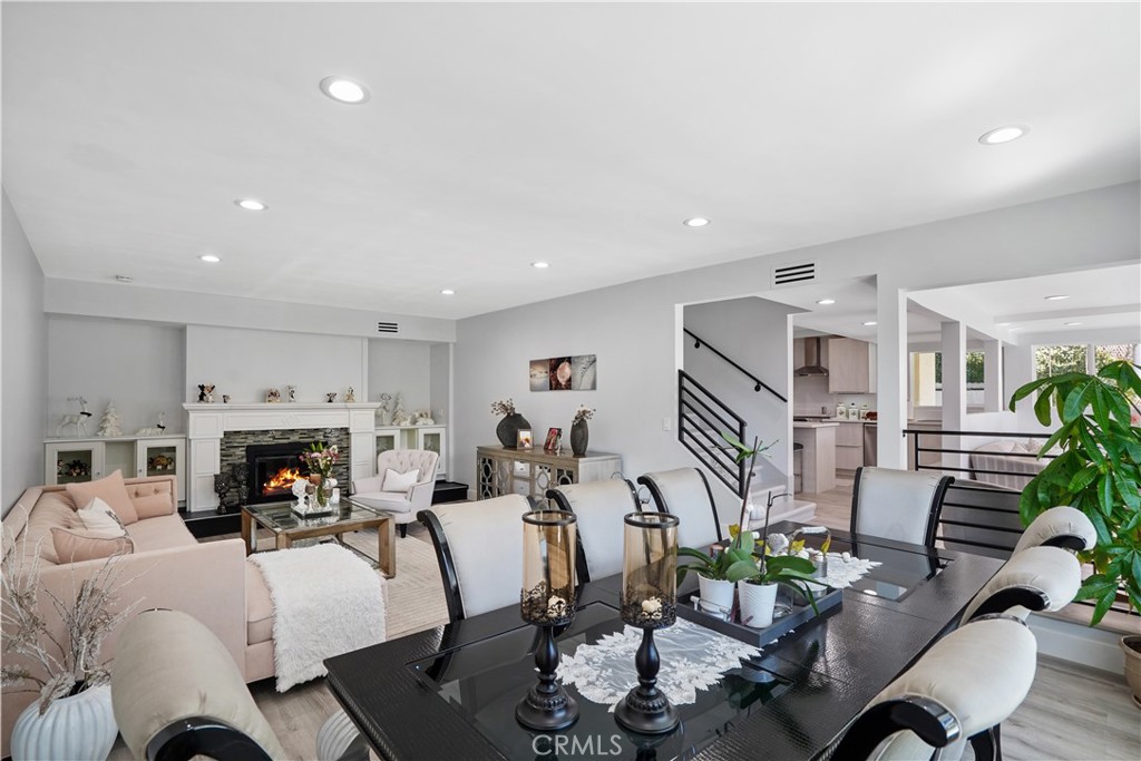 536 Cavanagh Road Glendale, CA 91207 - Photo 16 of 39 a living room with fireplace furniture and a wooden floor