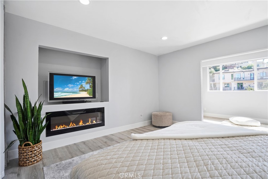 536 Cavanagh Road Glendale, CA 91207 - Photo 10 of 39 a bedroom with a bed and a fireplace