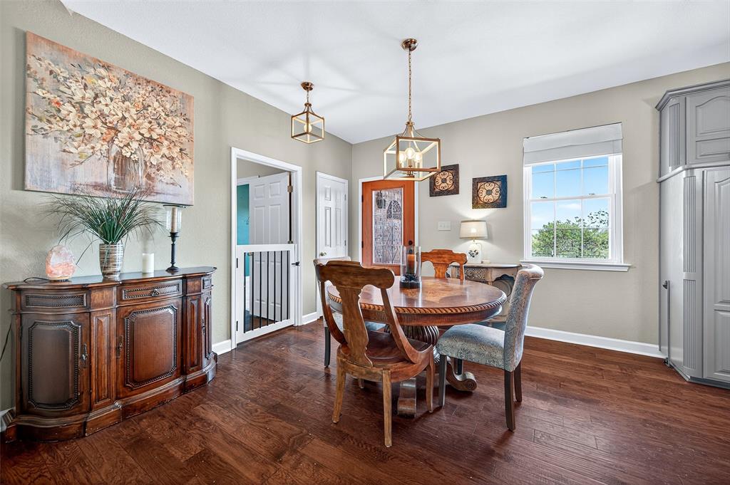 551 Massey Road Gunter, TX 75058 - Photo 13 of 40 a view of a dining room with furniture window and wooden floor