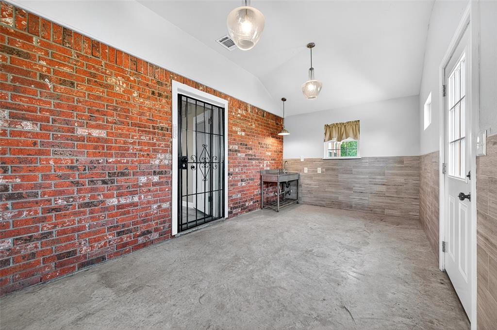 551 Massey Road Gunter, TX 75058 - Photo 16 of 40 a view of an empty room with a fireplace