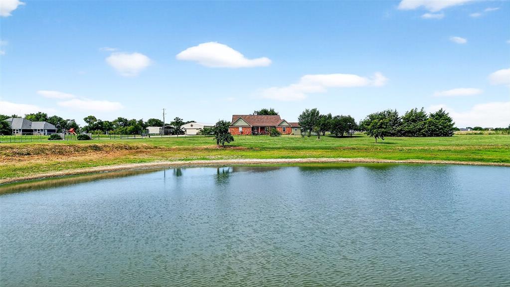 551 Massey Road Gunter, TX 75058 - Photo 28 of 40 a view of a water with large trees