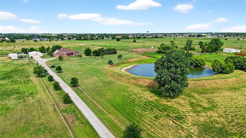 551 Massey Road Gunter, TX 75058 - Photo 30 of 40 a view of a lake with a yard