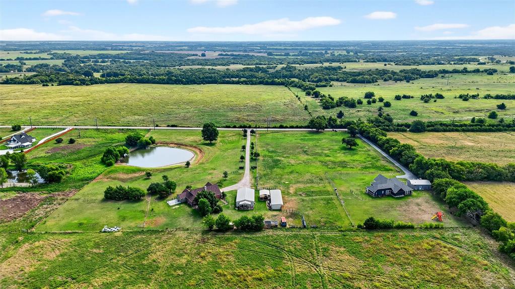 551 Massey Road Gunter, TX 75058 - Photo 31 of 40 an aerial view of a houses with outdoor space and lake view