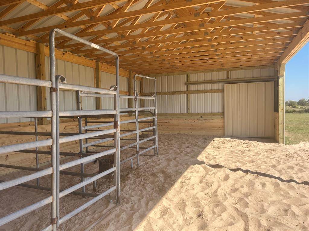 551 Massey Road Gunter, TX 75058 - Photo 32 of 40 a view of empty room with wooden floor and windows