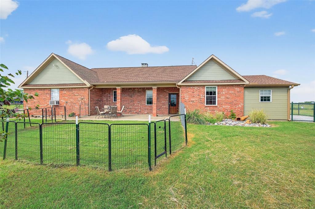 551 Massey Road Gunter, TX 75058 - Photo 5 of 40 a front view of house with yard and green space