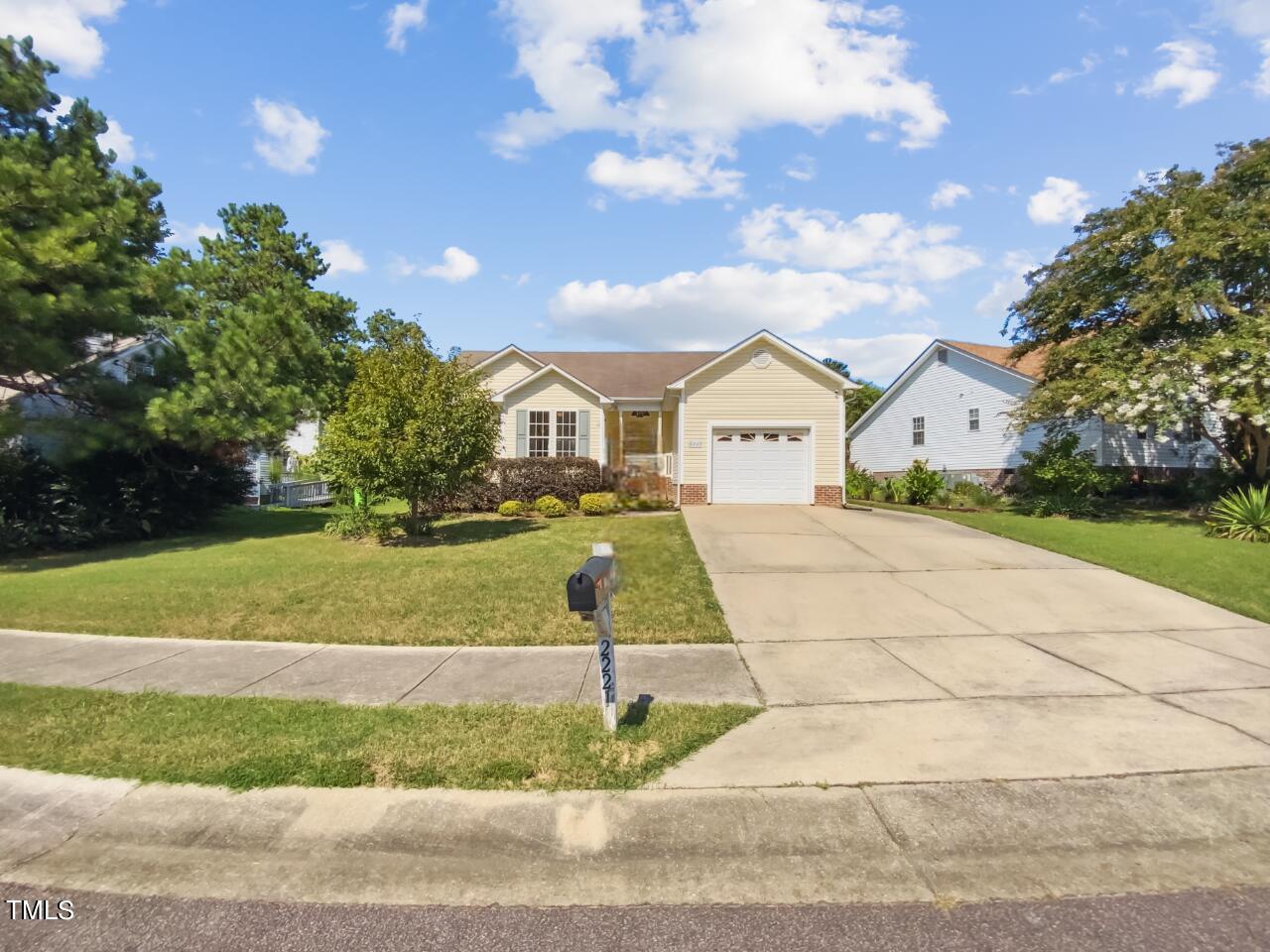 2221 Lockwood Folly Lane Raleigh, NC 27610 - Photo 1 of 19 a view of house with yard