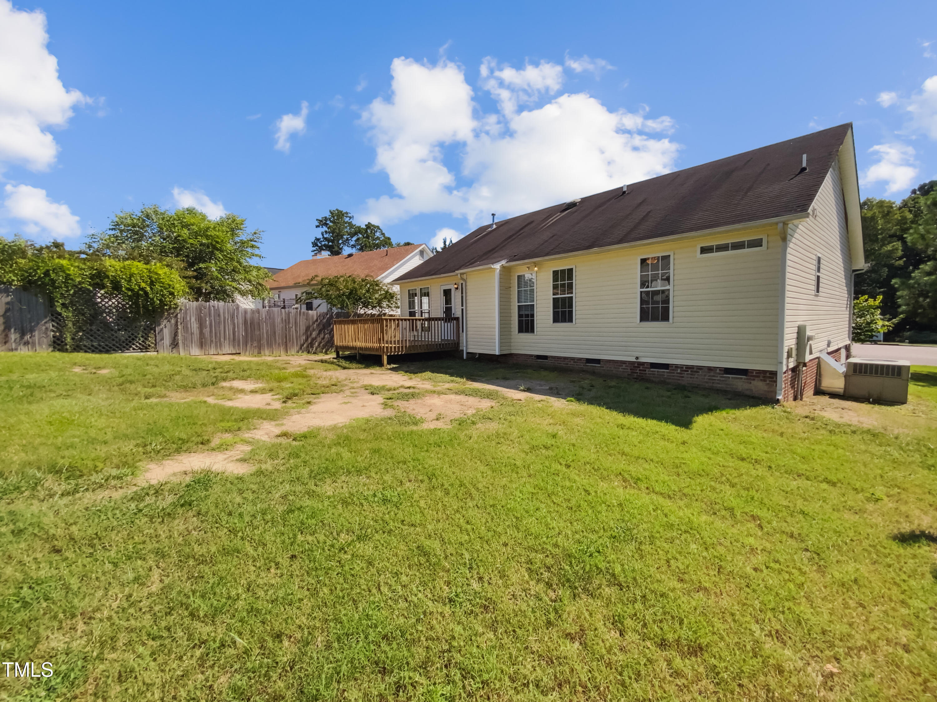 2221 Lockwood Folly Lane Raleigh, NC 27610 - Photo 7 of 19 a house view with a garden space