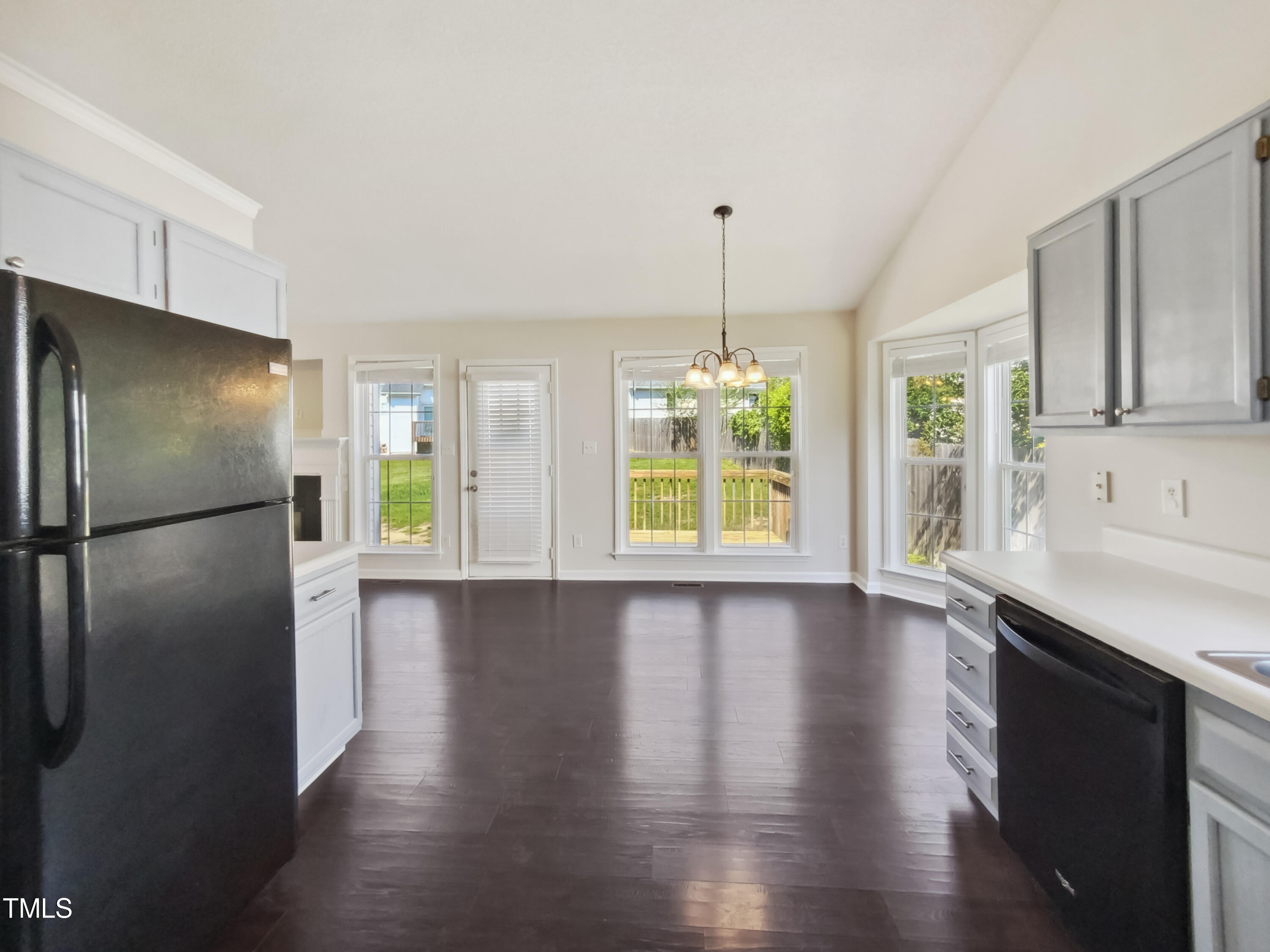 2221 Lockwood Folly Lane Raleigh, NC 27610 - Photo 10 of 19 a kitchen with stainless steel appliances a refrigerator sink and cabinets