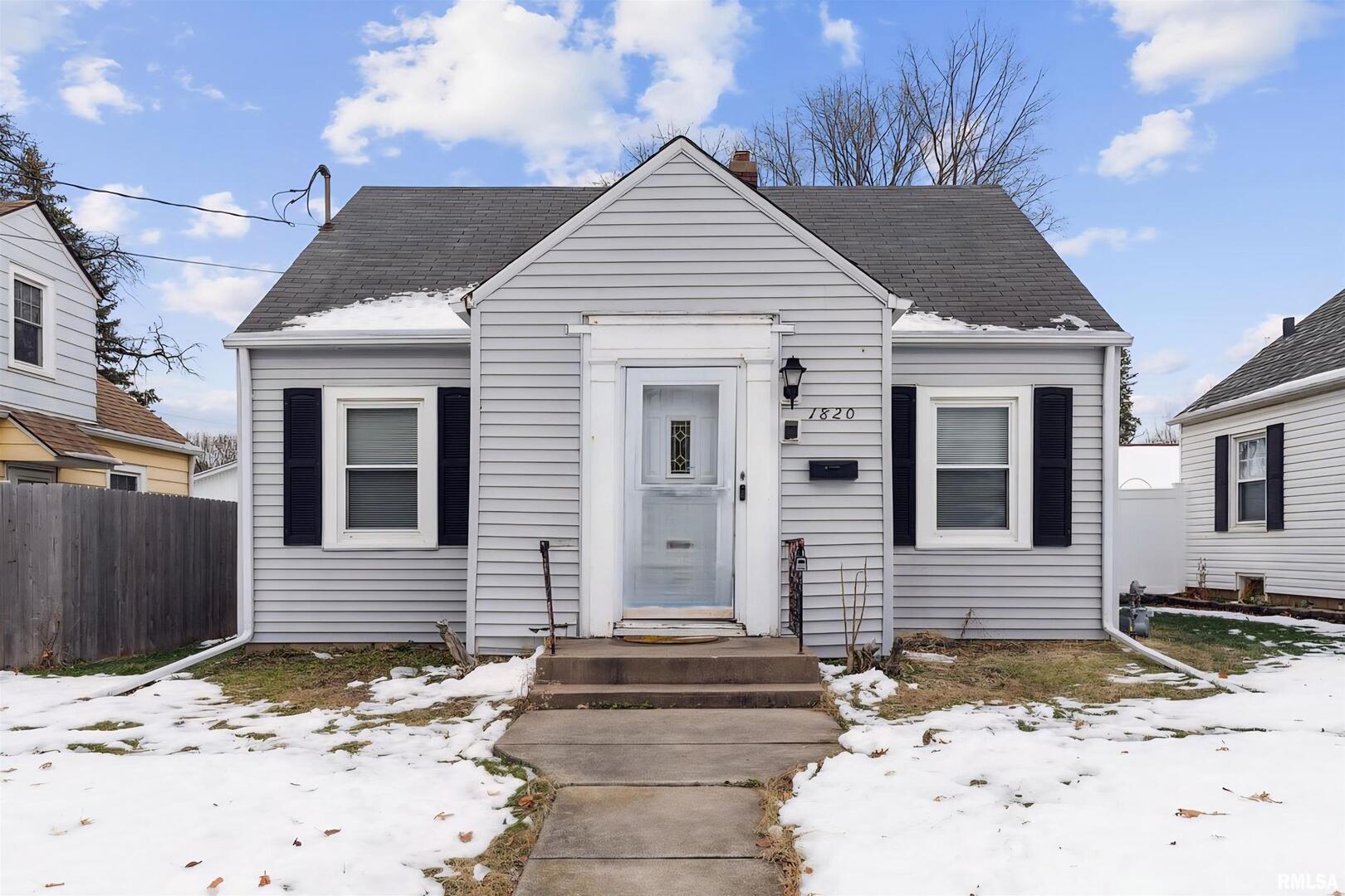 1820 33rd Street Moline, IL 61265 - Photo 2 of 25 a front view of a house