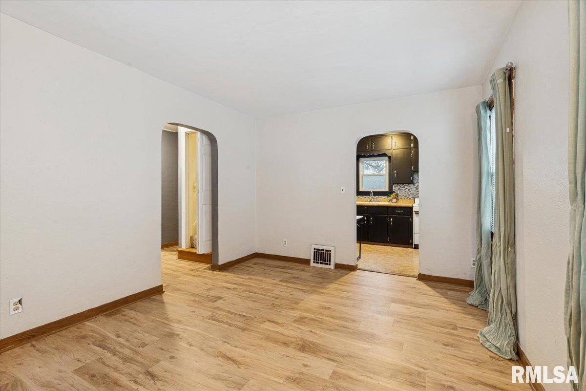 1820 33rd Street Moline, IL 61265 - Photo 5 of 25 a view of a livingroom with wooden floor