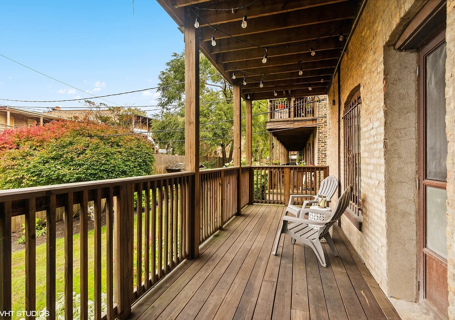 Undisclosed Address Chicago, IL 60613 - Photo 19 of 19 a view of a balcony with wooden floor