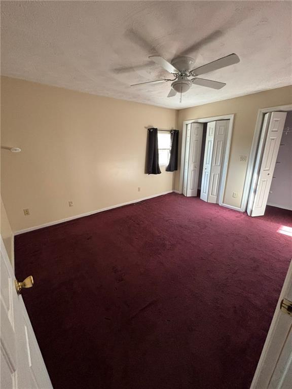 966 West Ridge Avenue Sharpsville, PA 16150 - Photo 10 of 17 a view of a big room with windows and ceiling fan