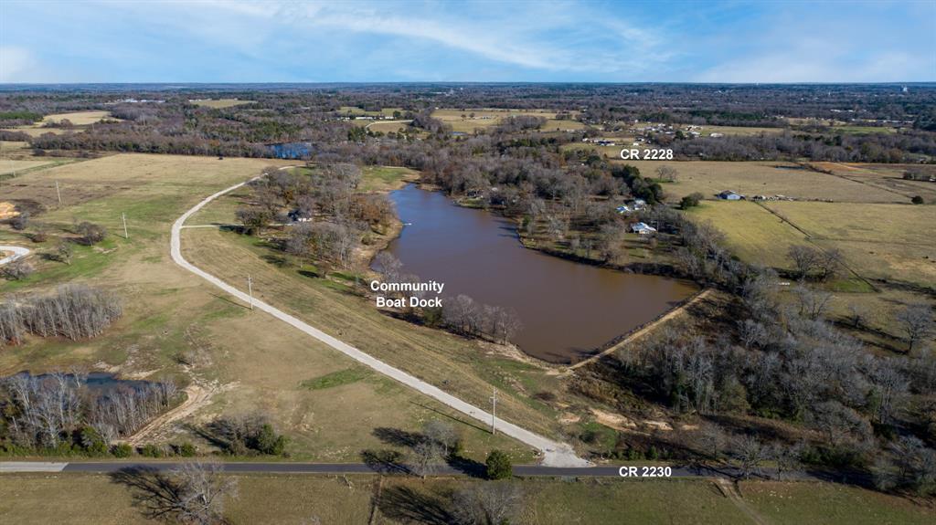2228 Mineola Tx 75773 Mineola, TX 75773 - Photo 15 of 16 an aerial view of residential houses with outdoor space