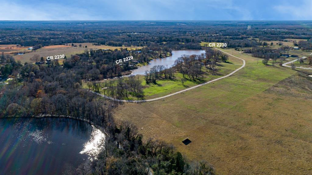 2228 Mineola Tx 75773 Mineola, TX 75773 - Photo 5 of 16 a view of a lake with a city