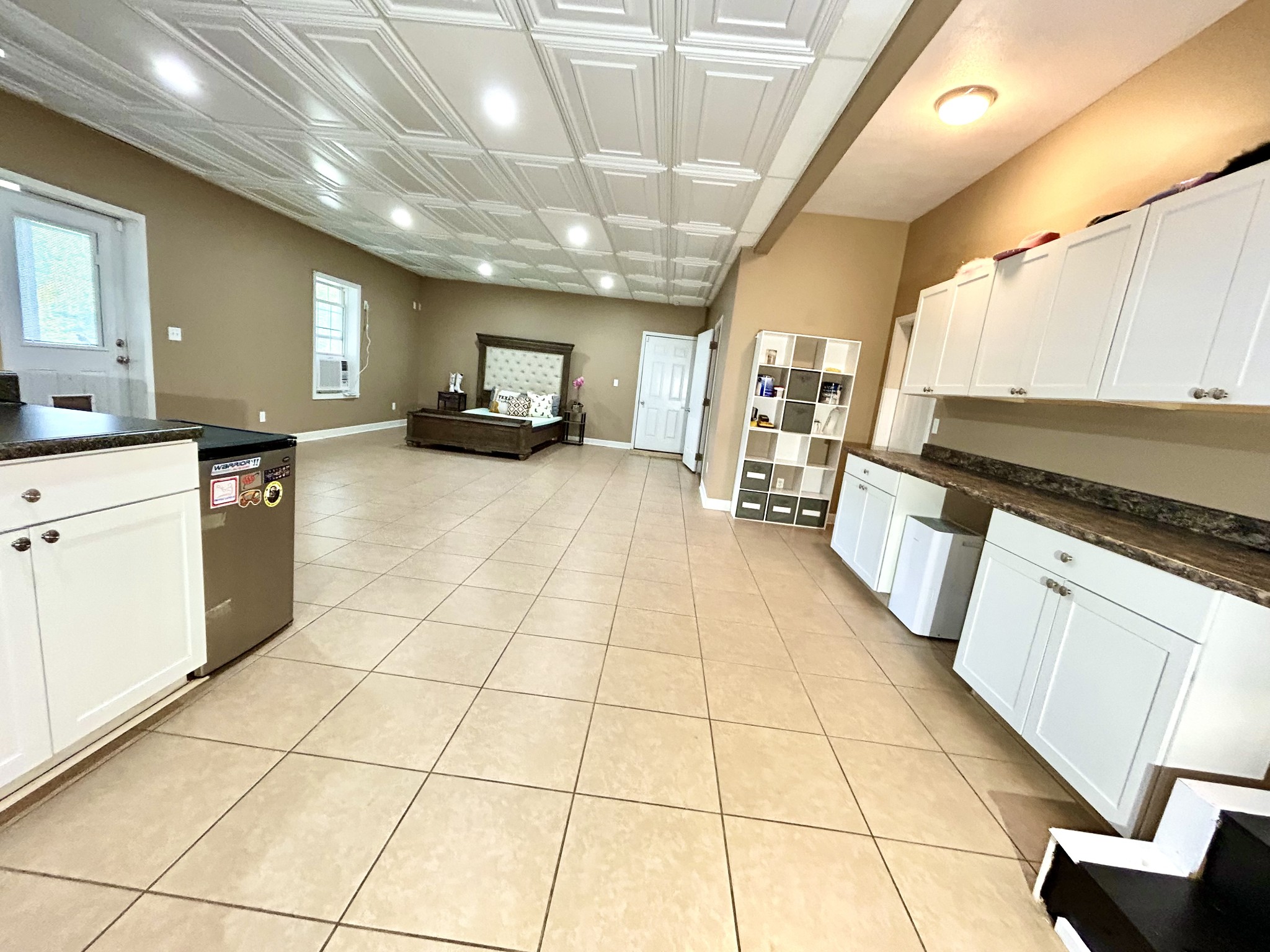 1198 Ed Sanders Road Lynchburg, TN 37352 - Photo 25 of 36 a kitchen with stainless steel appliances granite countertop a sink and cabinets