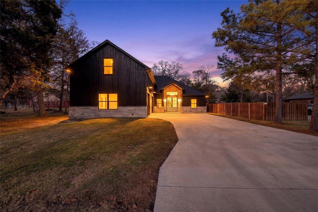 114 Castlewood Road Enchanted Oaks, TX 75156 - Photo 2 of 33 a house view with a outdoor space