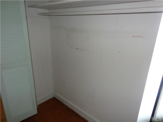 800 Daniels Street Raleigh, NC 27605 - Photo 11 of 23 One of two master bedroom closets.