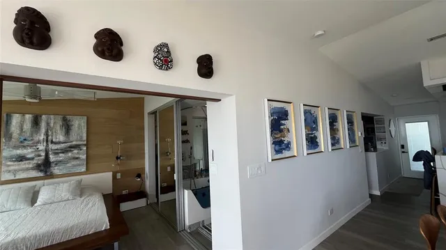 a view of an entryway and livingroom