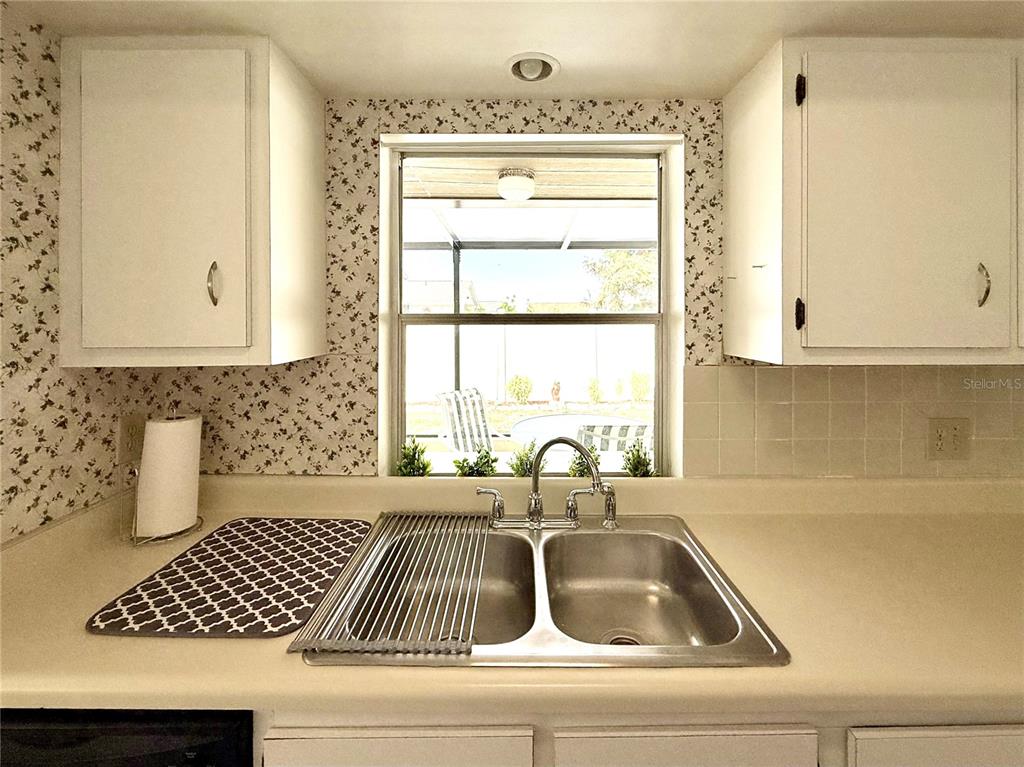 13508 Santa Rosa Avenue Port Charlotte, FL 33981 - Photo 13 of 30 a kitchen with a sink and a window