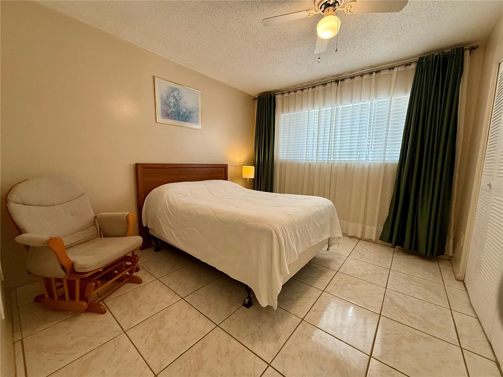 13508 Santa Rosa Avenue Port Charlotte, FL 33981 - Photo 24 of 30 a bedroom with a bed and a window