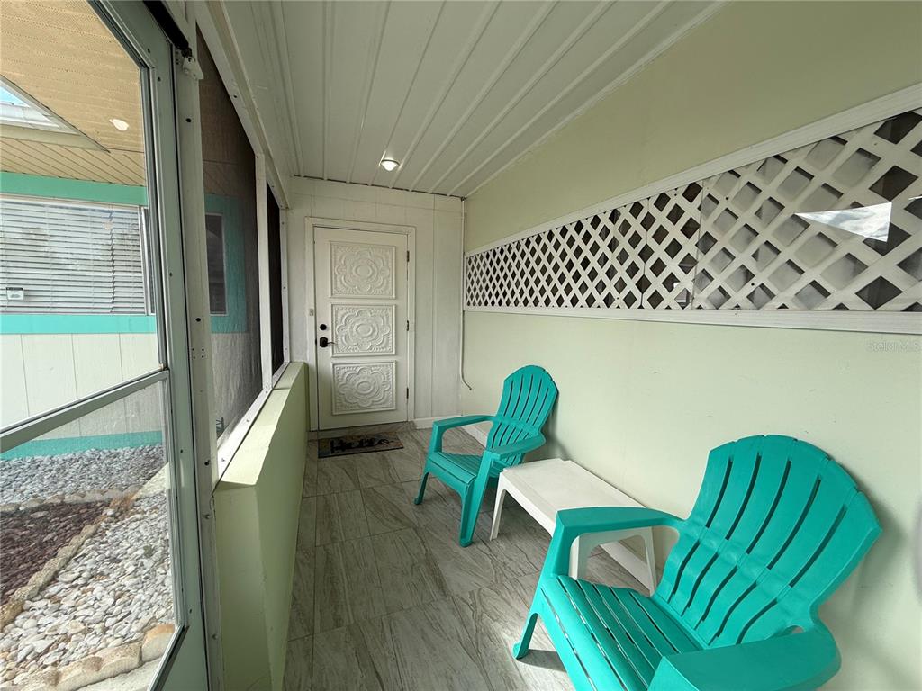 13508 Santa Rosa Avenue Port Charlotte, FL 33981 - Photo 5 of 30 a view of chairs in wooden floor