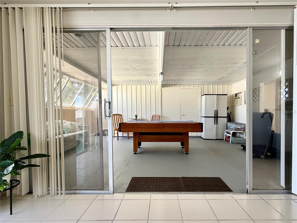 13508 Santa Rosa Avenue Port Charlotte, FL 33981 - Photo 9 of 30 a reading room with furniture and a potted plant