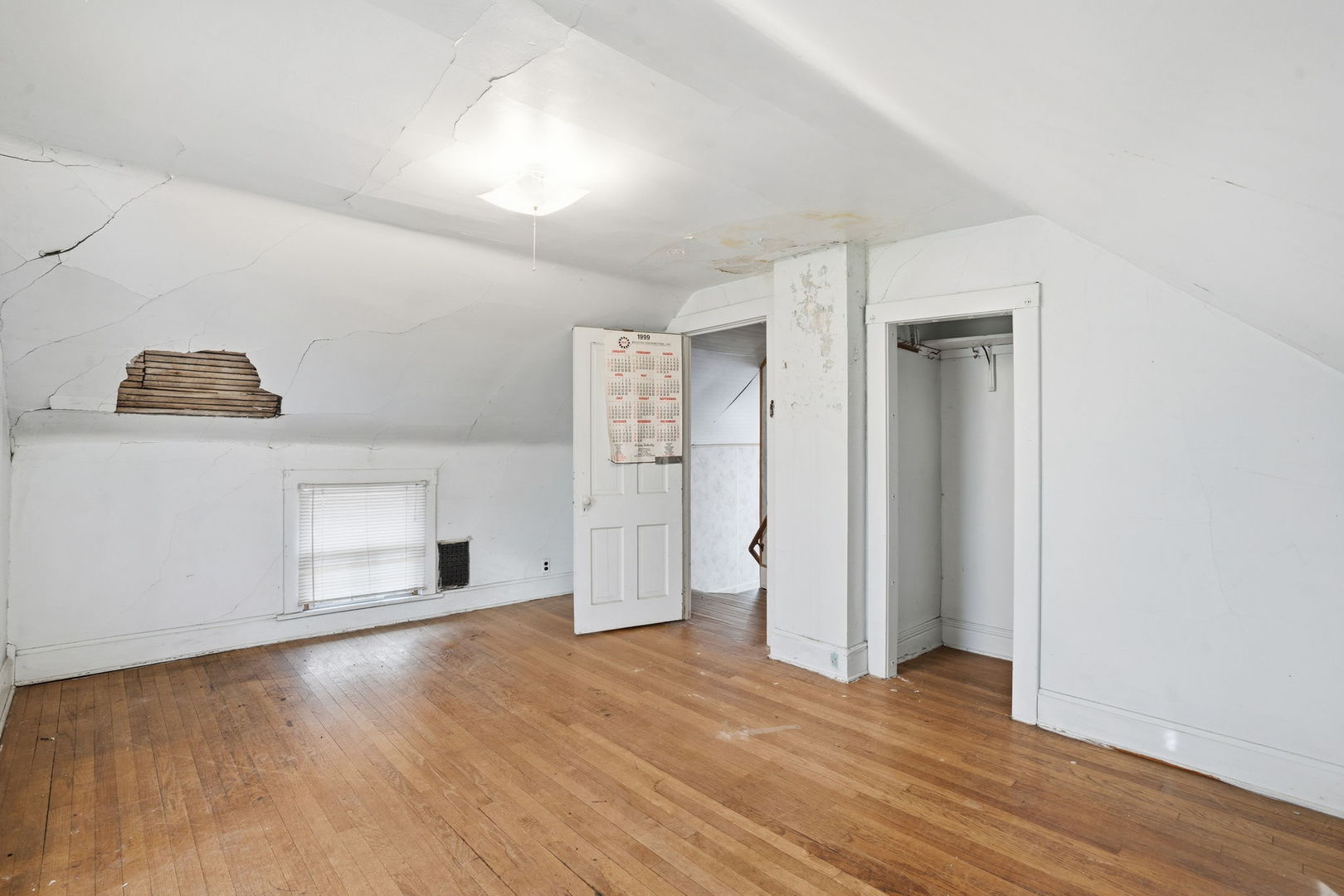 411 39th Street Moline, IL 61265 - Photo 11 of 16 a view of empty room with wooden floor