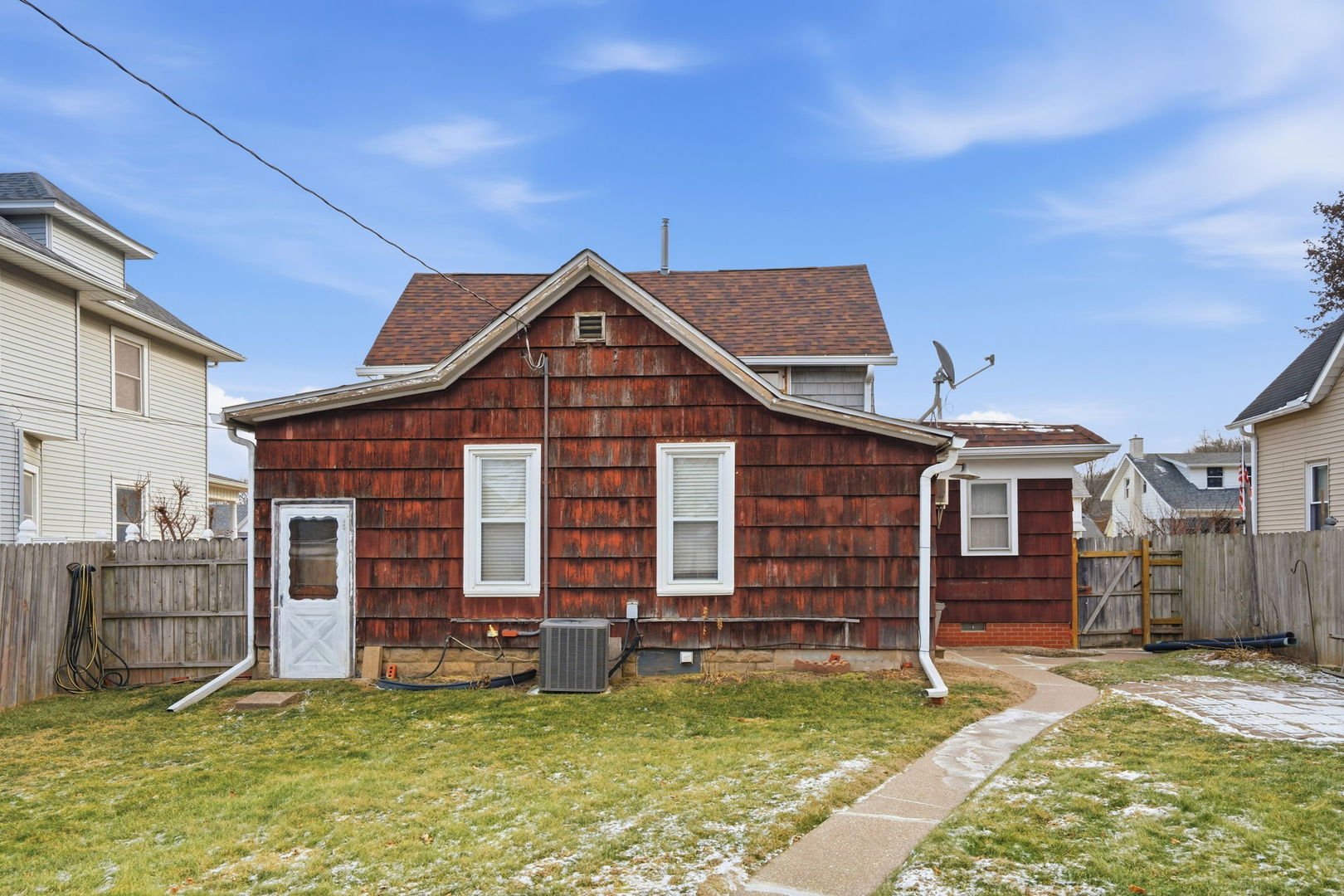 411 39th Street Moline, IL 61265 - Photo 14 of 16 a view of a house with a yard