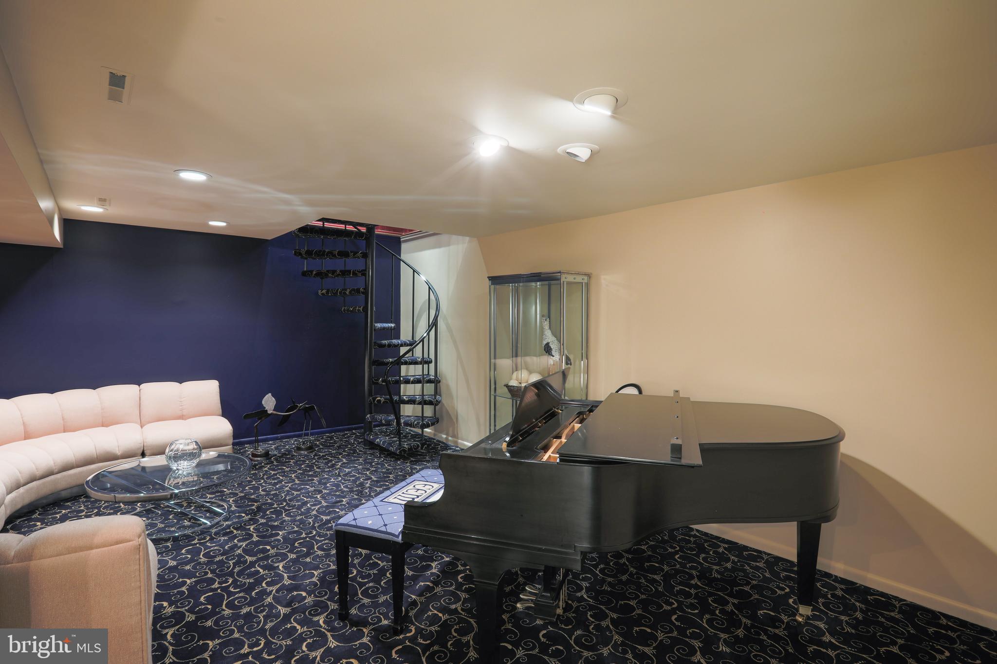 2117 Burdock Road Baltimore, MD 21209 - Photo 43 of 66 Music/media room with spiral stairs