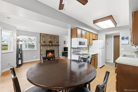 a view of a livingroom with furniture and a fireplace