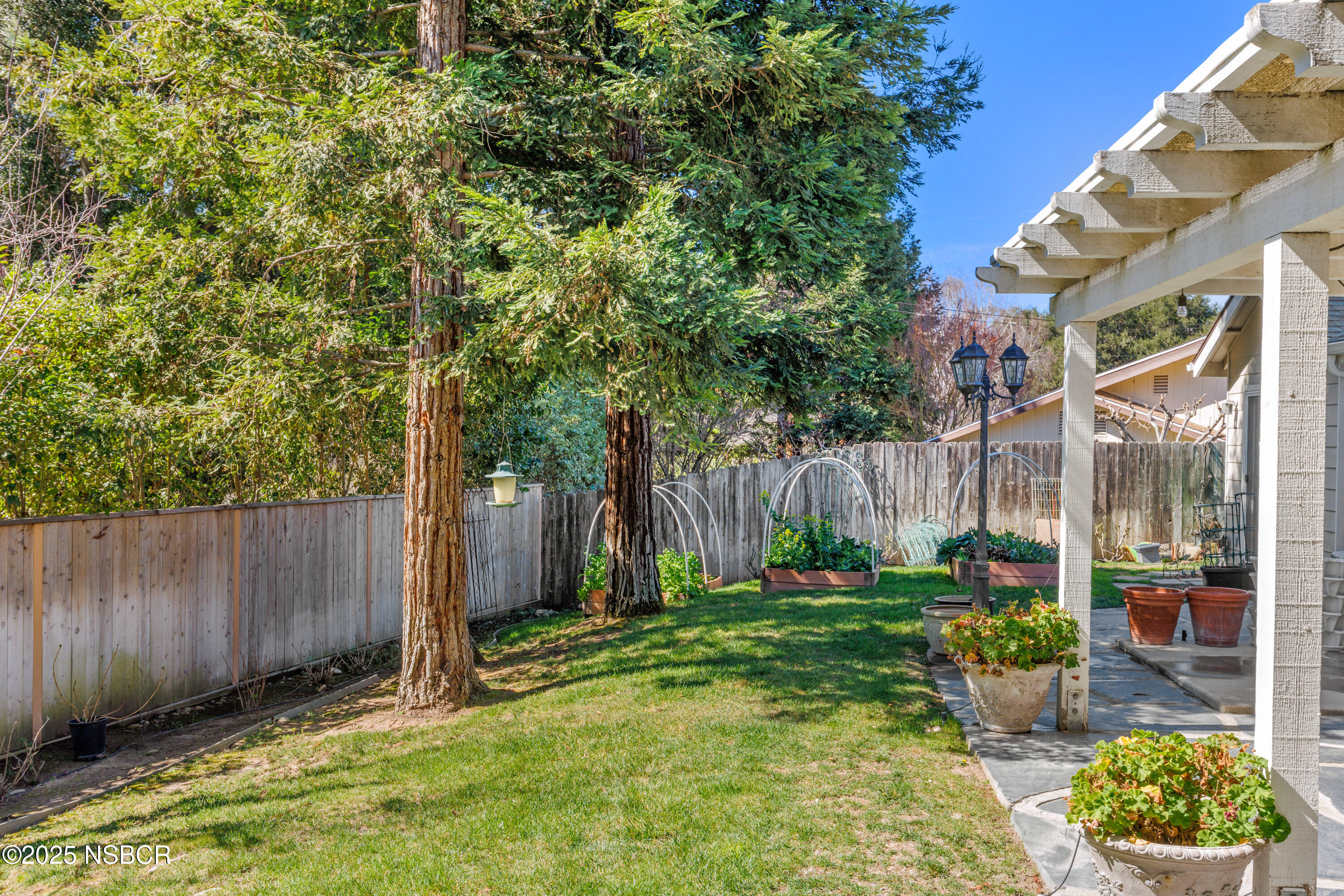 922 College Canyon Road Solvang, CA 93463 - Photo 18 of 23 a backyard of a house with seating space