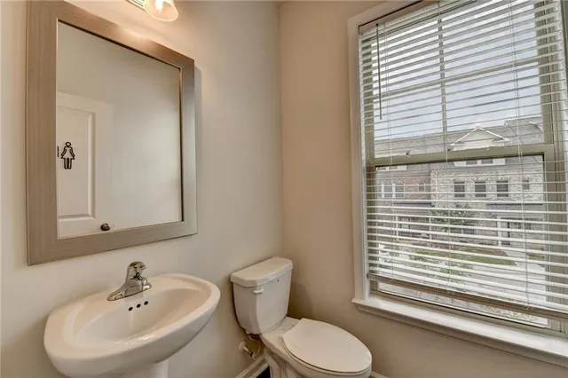 a bathroom with a sink and a toilet