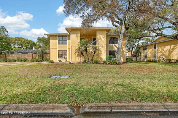 a view of a porch with a door
