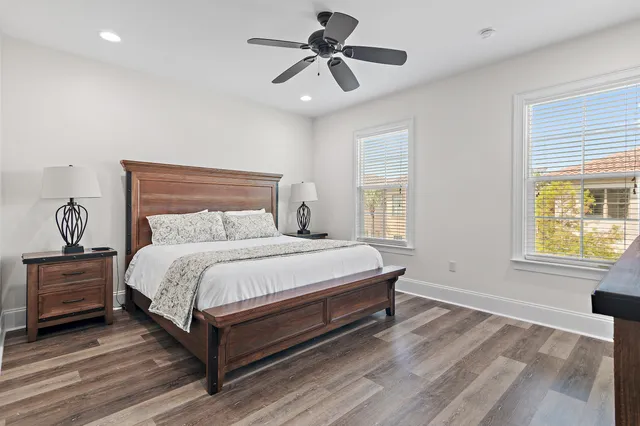 a bathroom with a sink toilet a mirror and shower