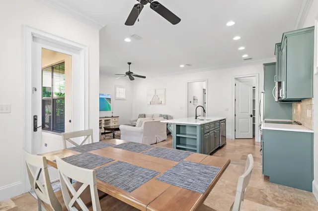 a living room with furniture and a table