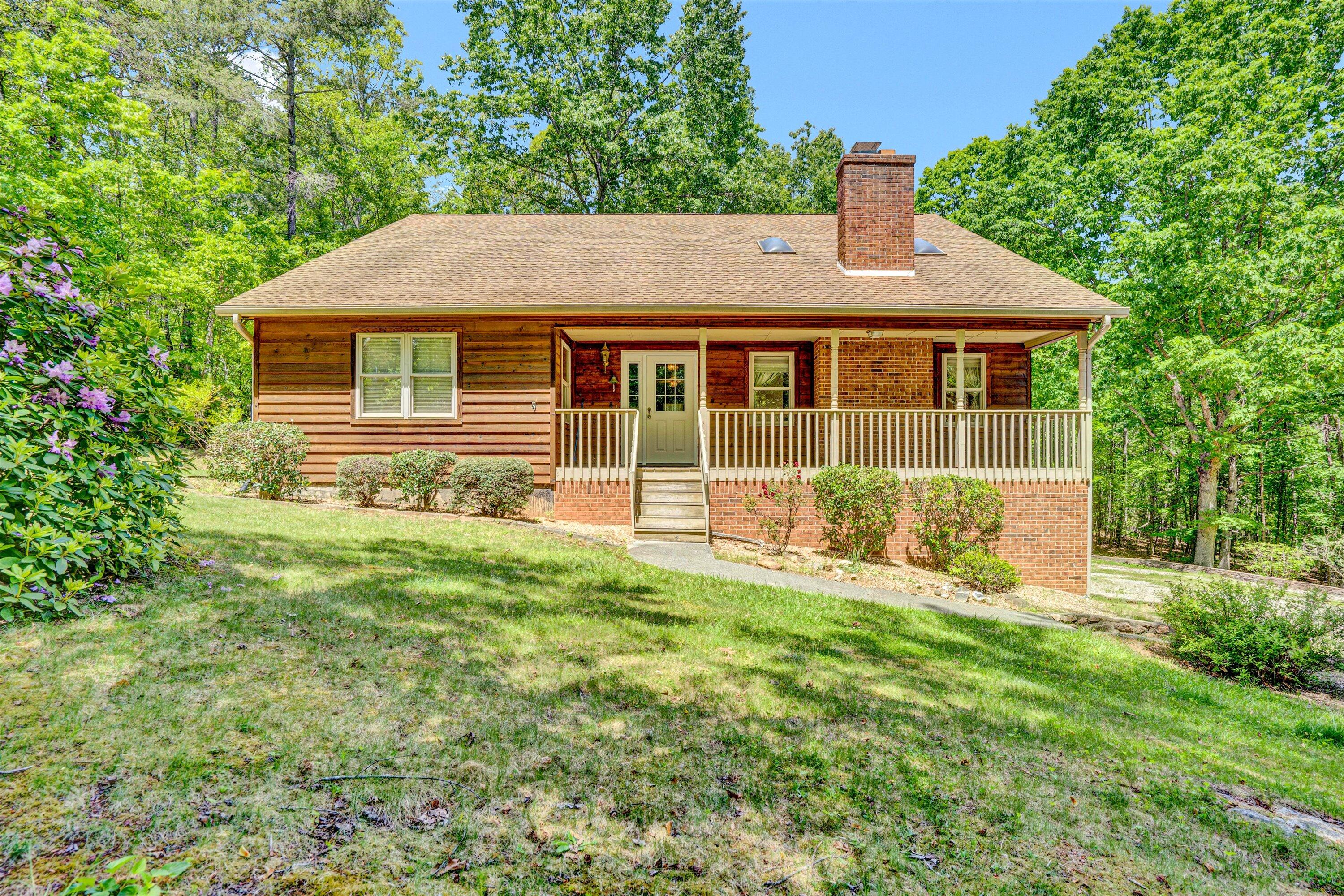 front view of a house with a yard