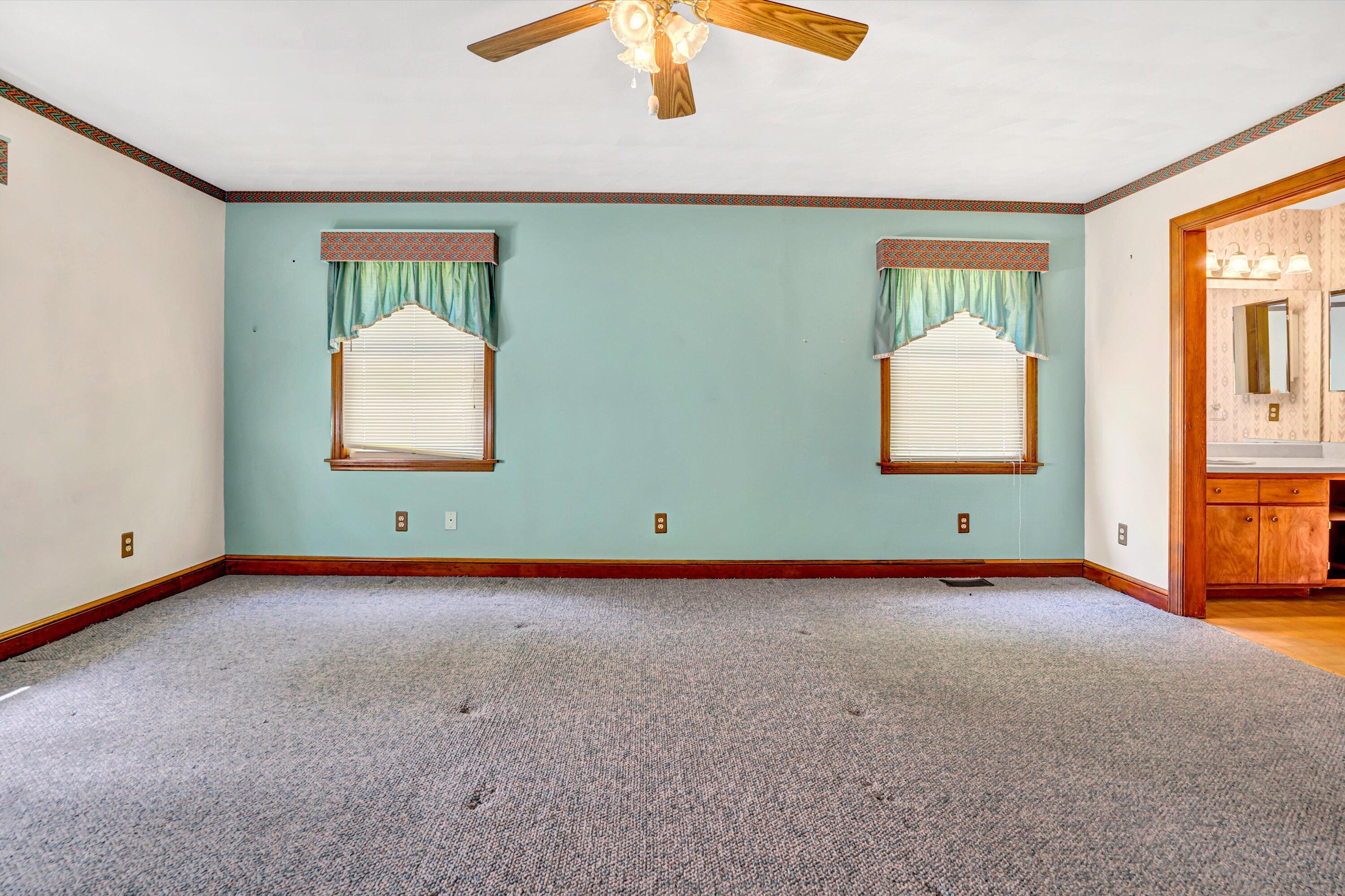 551 Heather Ridge Drive Rocky Mount, VA 24151 - Photo 15 of 41 an empty room with windows and closet