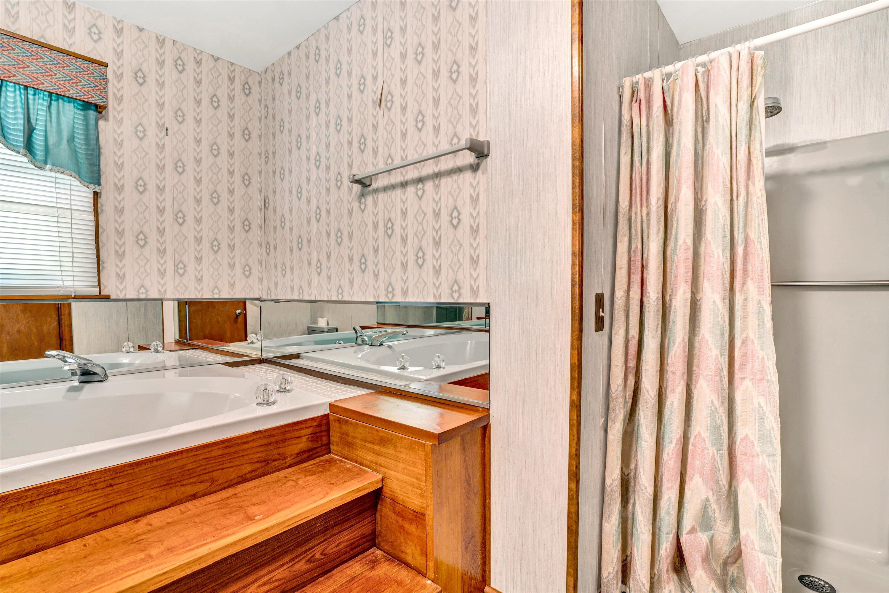 551 Heather Ridge Drive Rocky Mount, VA 24151 - Photo 21 of 41 a bathroom with a sink and a mirror
