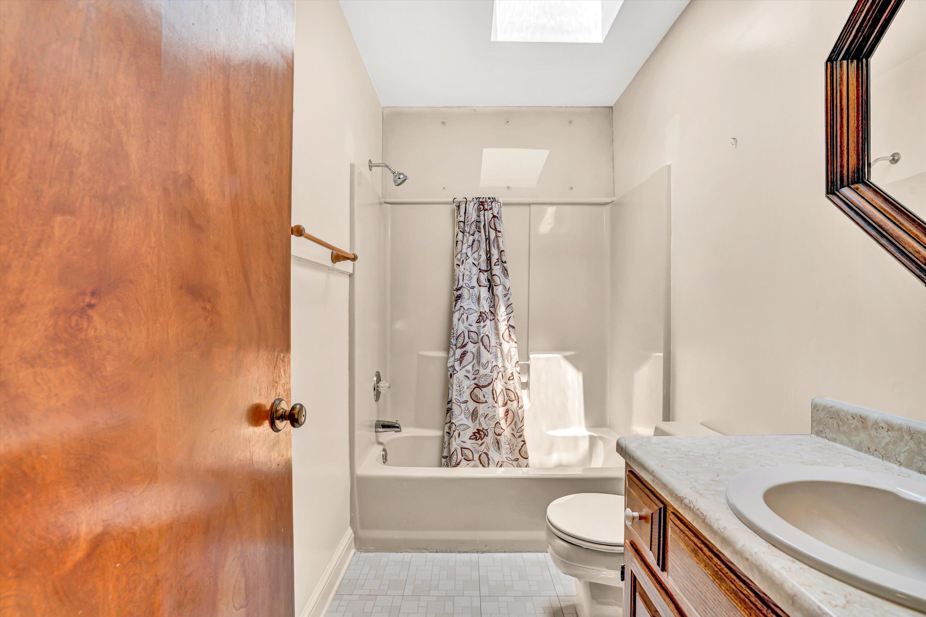 551 Heather Ridge Drive Rocky Mount, VA 24151 - Photo 23 of 41 a bathroom with a sink toilet and shower