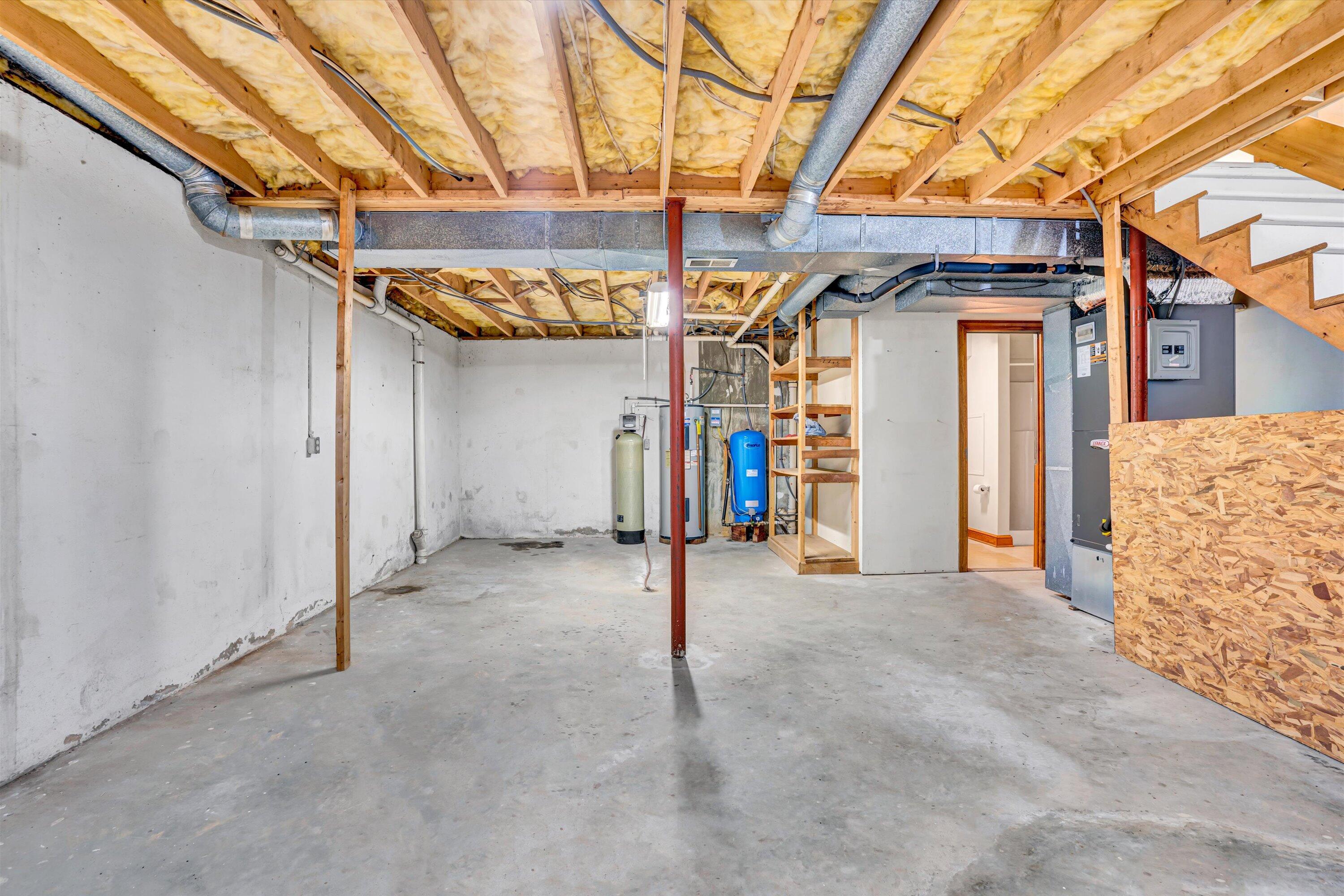551 Heather Ridge Drive Rocky Mount, VA 24151 - Photo 32 of 41 a view of a room with a bed and garage