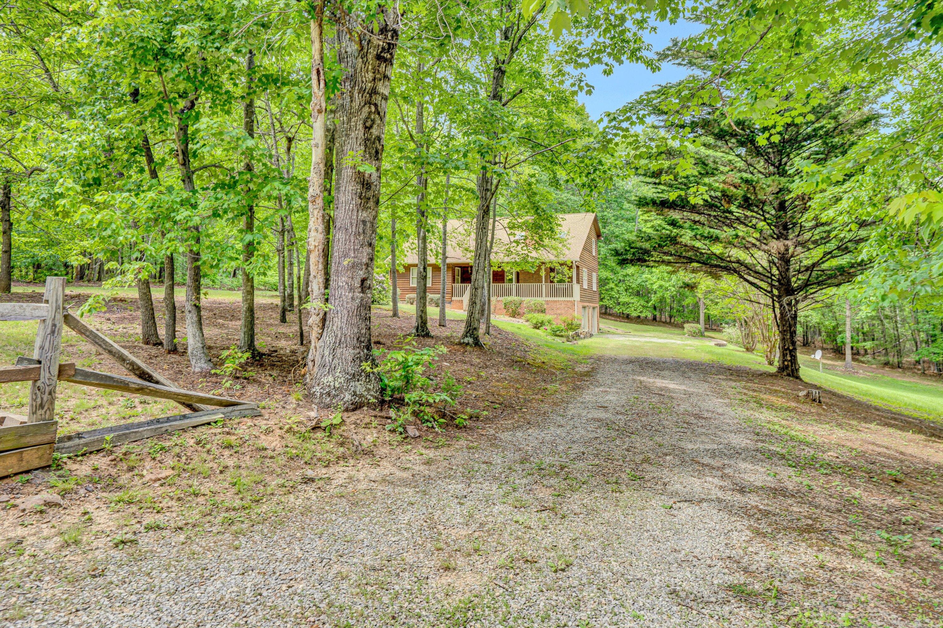 551 Heather Ridge Drive Rocky Mount, VA 24151 - Photo 37 of 41 a view of a yard with plants and trees