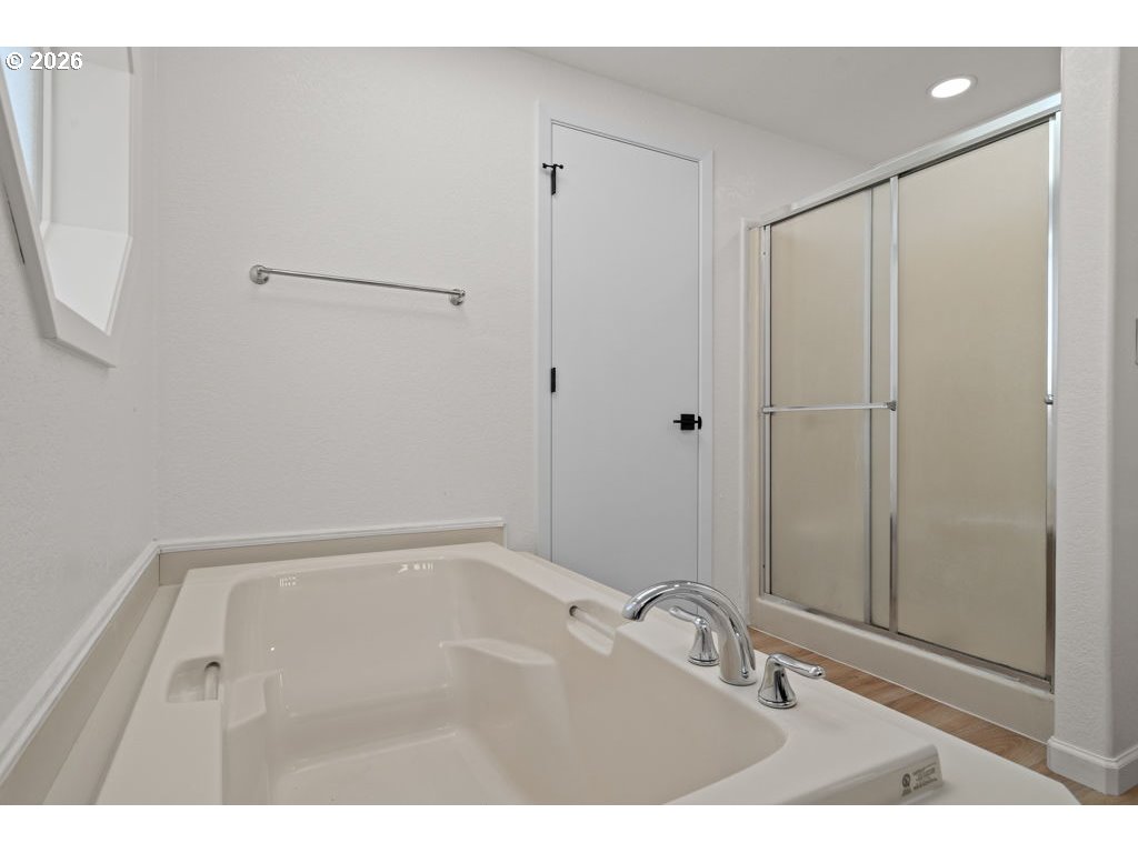 11201 Northwest 3rd Avenue Vancouver, WA 98685 - Photo 18 of 21 a bathroom with a shower and a sink