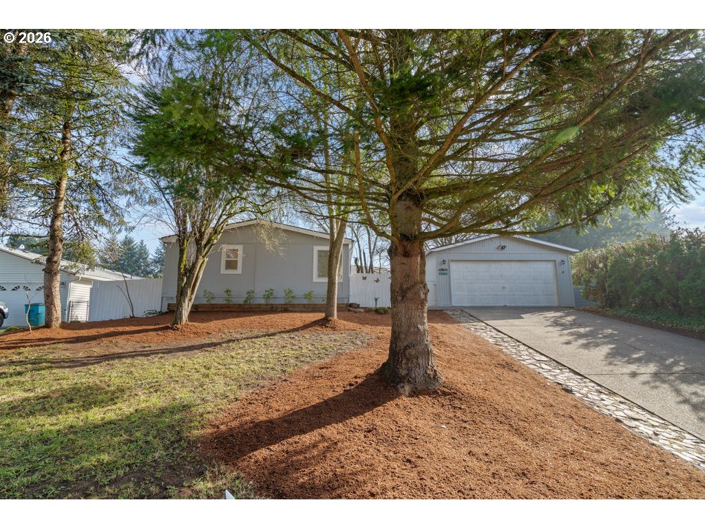 11201 Northwest 3rd Avenue Vancouver, WA 98685 - Photo 2 of 21 a house view with a backyard space
