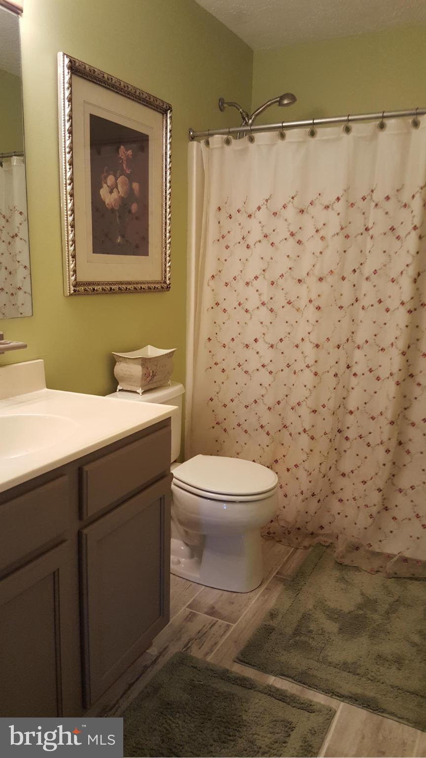 646 San Gabriel Road Lusby, MD 20657 - Photo 18 of 22 Upstairs bathroom