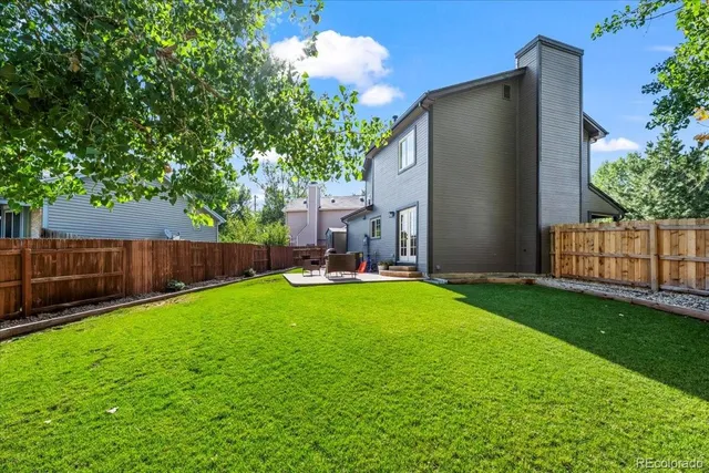 a view of backyard with green space