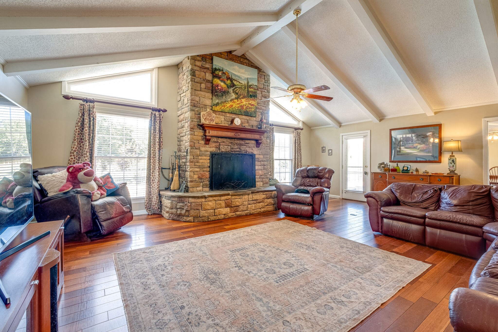 5025 Hickory Ridge Road Lebanon, TN 37087 - Photo 17 of 52 a living room with furniture fireplace and a flat screen tv