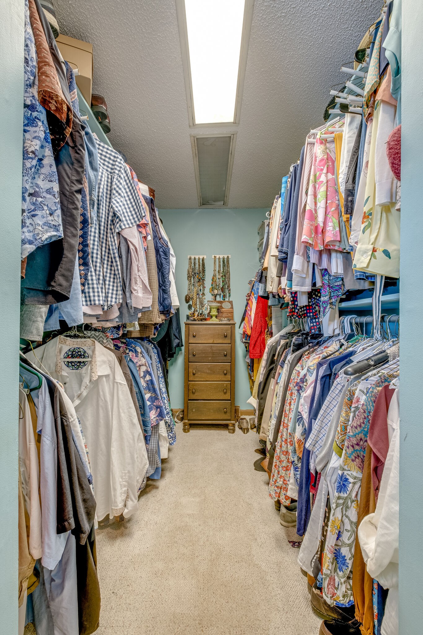 5025 Hickory Ridge Road Lebanon, TN 37087 - Photo 23 of 52 a view of walk in closet with clothes and shoes